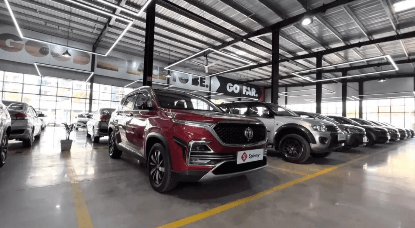 Spinny used-car showroom in India, illustrating the inventory-led retail model behind its proposed IPO.